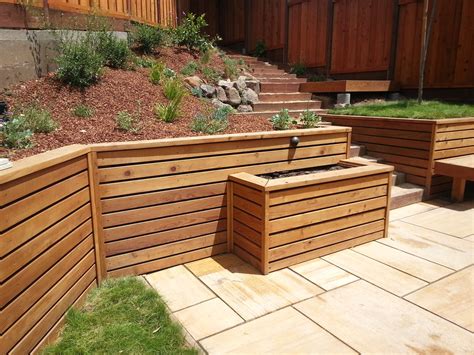 Wood retaining wall - Jan 13, 2020 ... If the water table is high, the pressure can build up behind the wall and causes problems. Do not place the plastic sheet behind the wall but ...